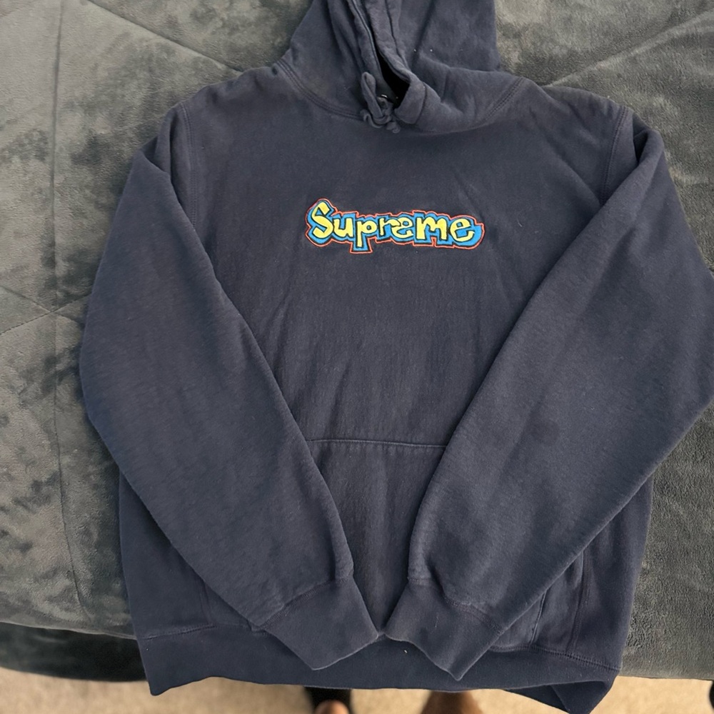 Supreme Dark Blue Hoodie with Vibrant Logo